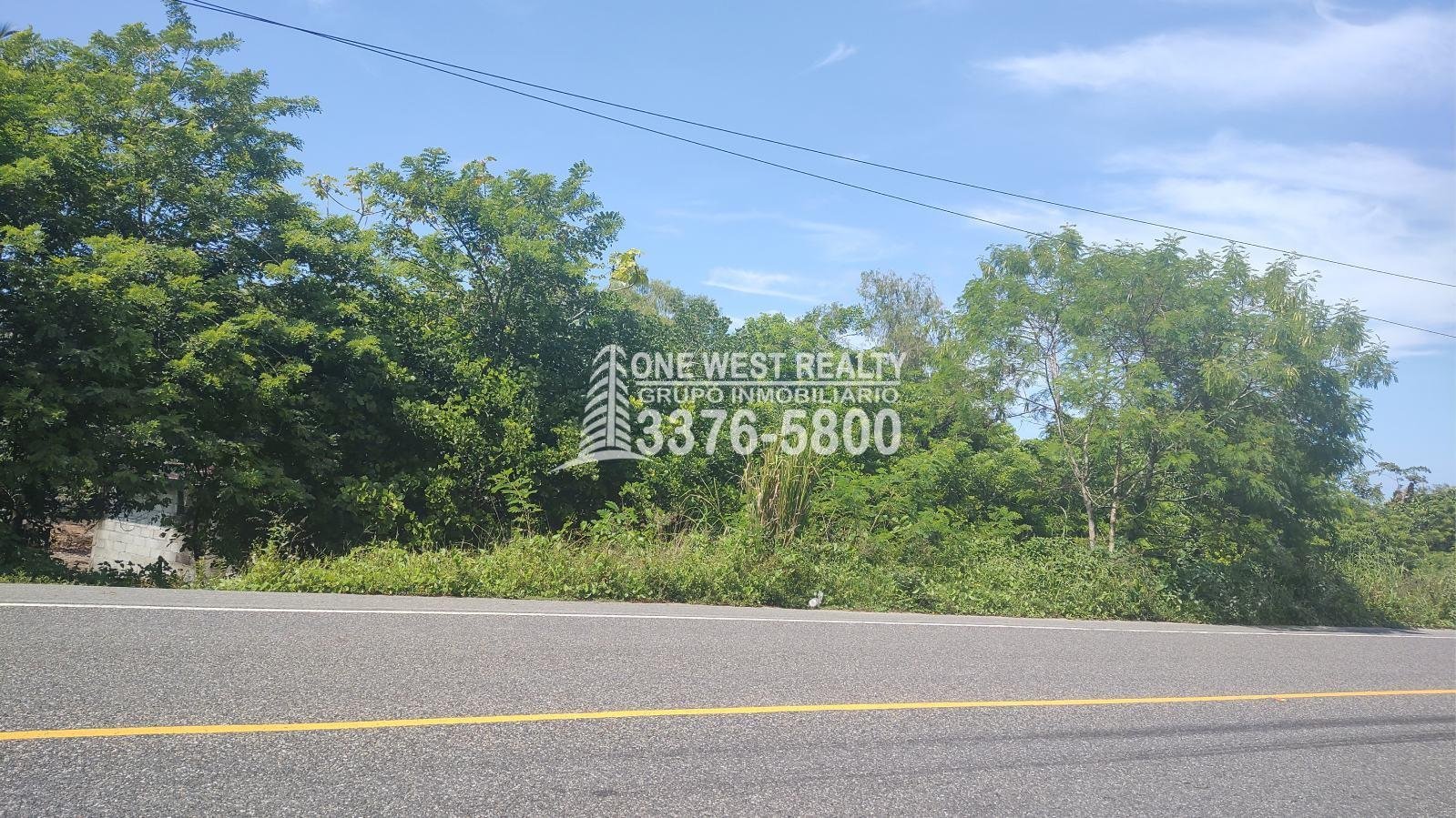 se-vende-terreno-en-omoa_one-west-realty-2 Terreno de venta en Omoa Cortes con naciente de agua y cabañas