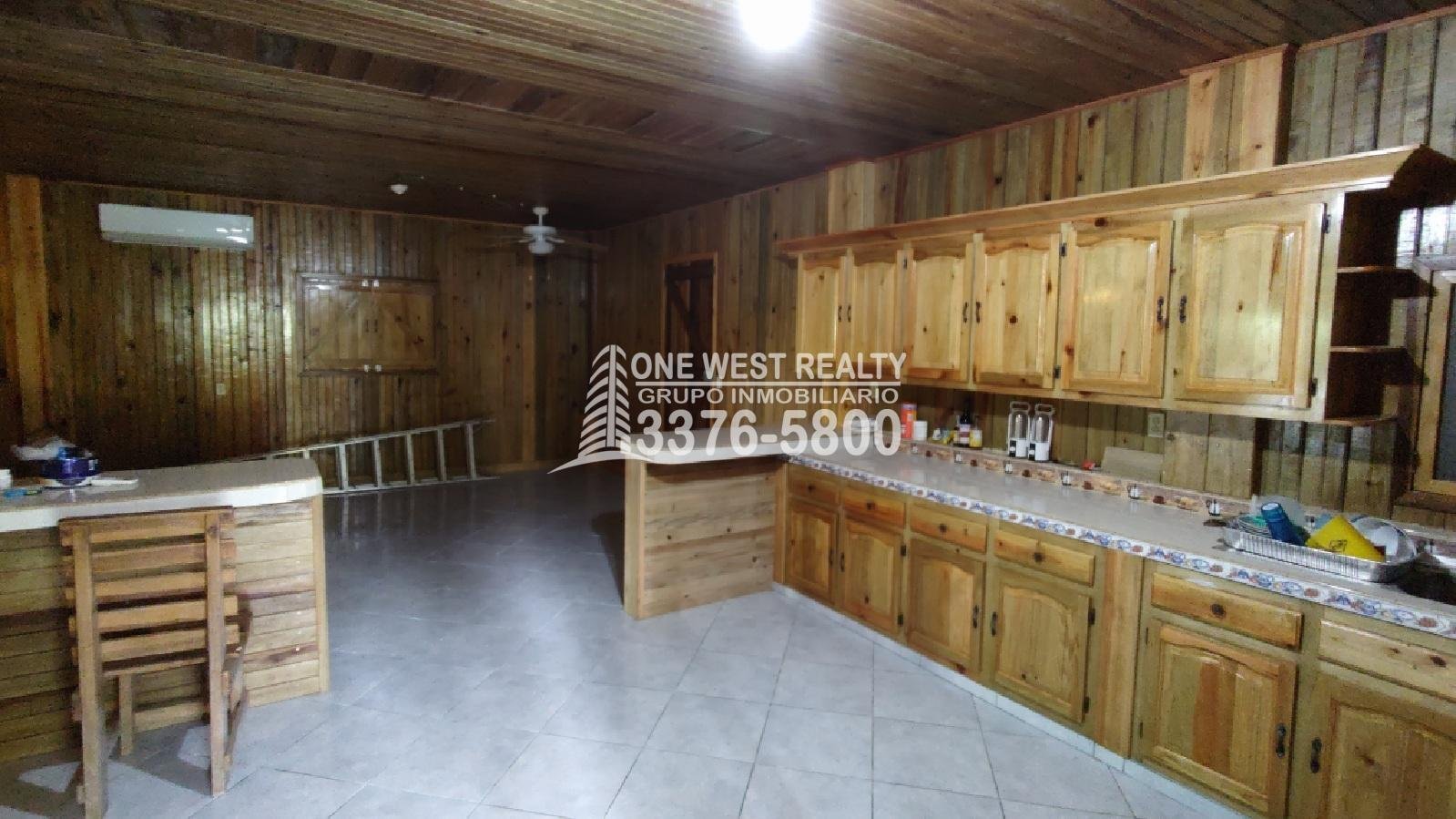 venta-de-casas-en-omoa_one-west-realty-2 Terreno de venta en Omoa Cortes con naciente de agua y cabañas